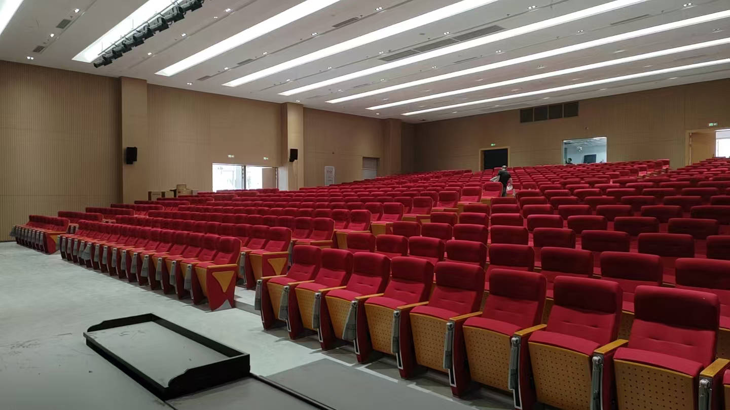 Completed red auditorium seating installation